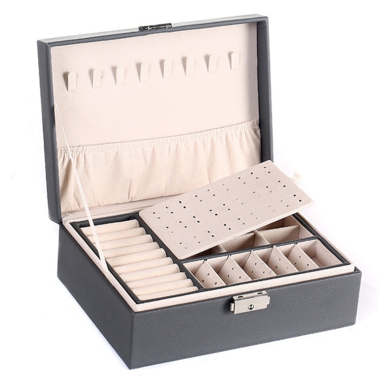 Dark gray jewelry box open with earring slots, lined trays, and front lock clasp