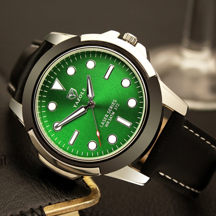 Men's sports watch with green dial and black leather strap, silver-toned round case