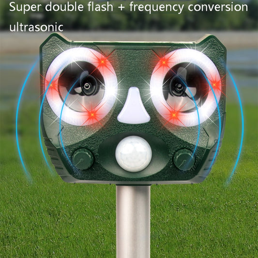 Solar ultrasonic repellent head with glowing red indicators and two speaker openings