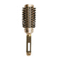 Ceramic hot roller brush with gold barrel, black bristles, and textured no-slip handle