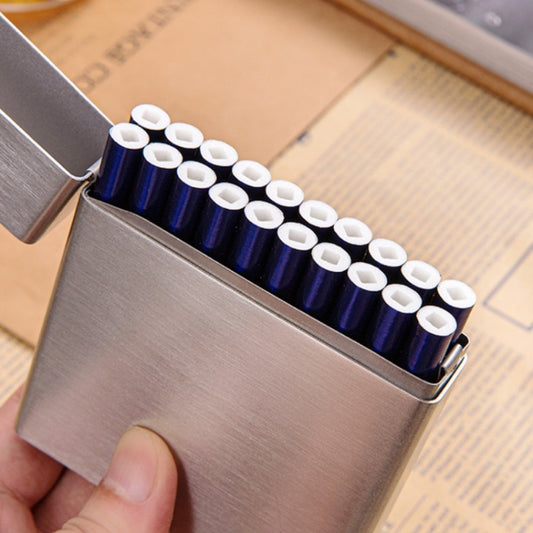 Stainless steel cigarette case open, holding blue cigarettes with white filters in row.