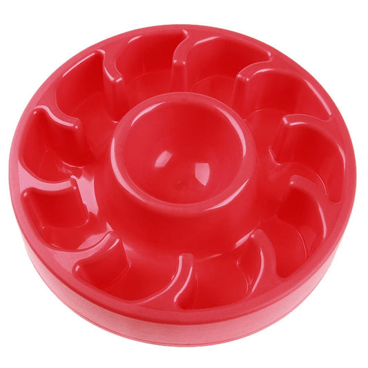 Red slow food pet bowl with raised ridges and a centered feeding cup