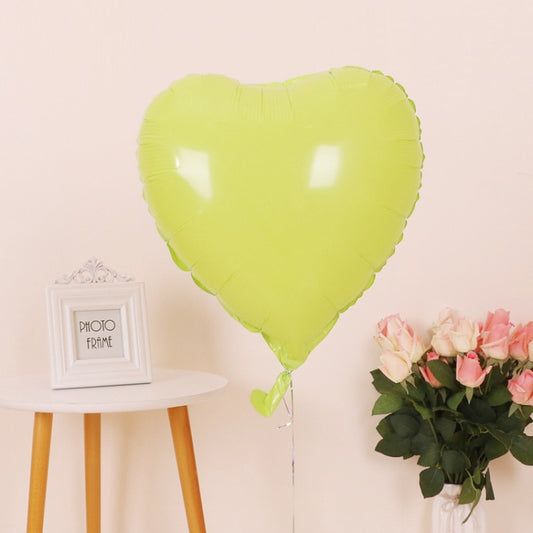 Lime green heart-shaped aluminum film balloon with ribbon and string