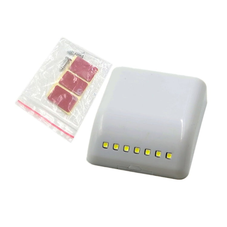 White LED night light with seven LED dots and accessory battery holder pack