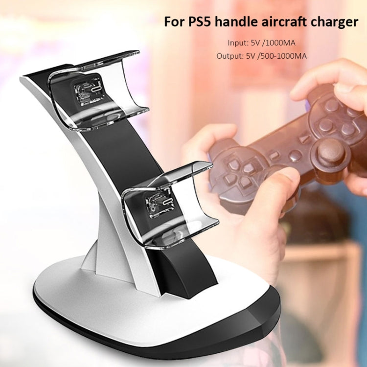 White and black dual controller charging stand with two top cradle slots for PS5