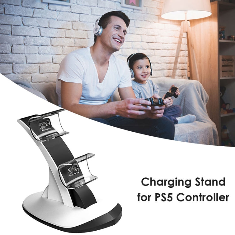 PS5 controller charging stand with two dock slots on a white base