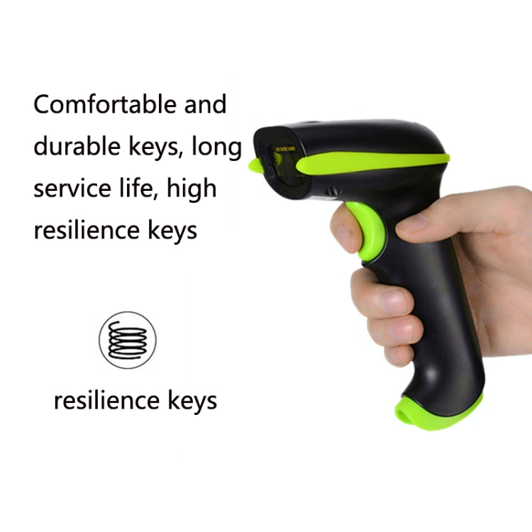 Handheld laser barcode scanner in hand, black with green accents, trigger visible.