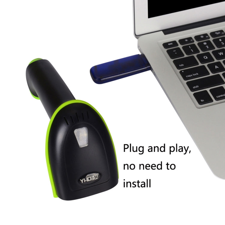 Handheld barcode scanner connected setup, green-accent scanner near a laptop.