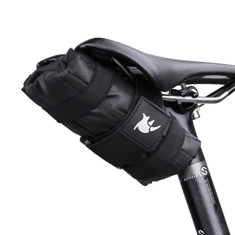 Black bicycle saddle tool storage bag with multiple strapped compartments and logo patch
