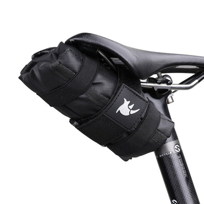 Black bicycle saddle tool storage bag with multiple strapped compartments and logo patch
