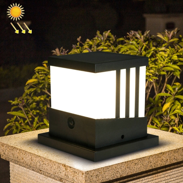 Black solar column outdoor lamp with frosted white sides and glowing light panel