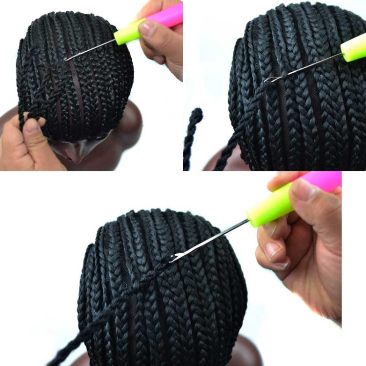 Black braided dreadlock net cap detail with needle tool for attaching braids.