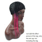 Black dreadlock net cap with long pink braid strands hanging down on the side.