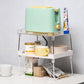 White desktop storage rack with two shelves and clear bins for kitchen supplies
