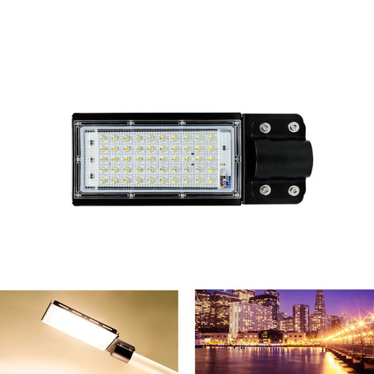 Black rectangular LED road floodlight with mounting bracket and screw holes