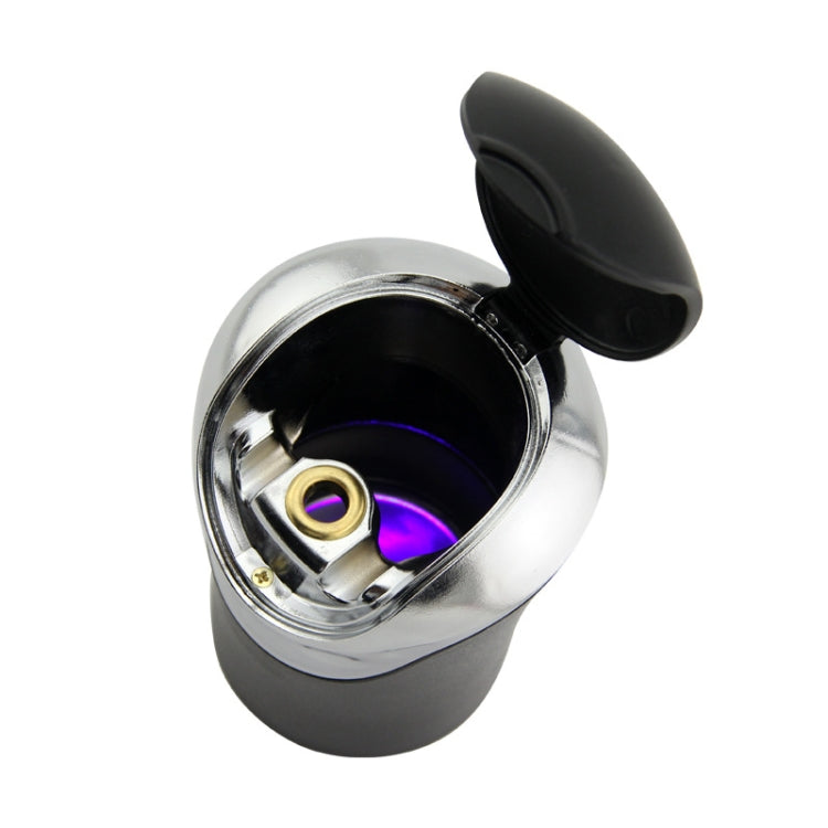 Mini ashtray with open lid showing chrome interior lamp ring
