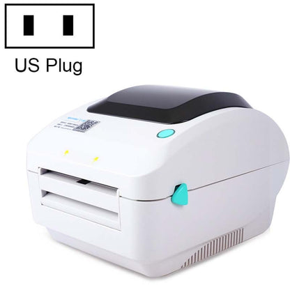 White thermal label printer with USB port, US plug, top cover and label feed slot visible.