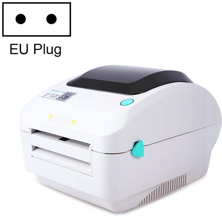 White thermal label printer with USB port, EU plug, top cover and label feed slot visible.