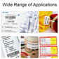 Thermal label examples on packages, bottles, and documents, showing versatile label output.