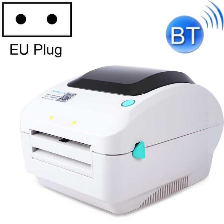 White thermal label printer with USB and Bluetooth, EU plug, top cover and feed slot visible.
