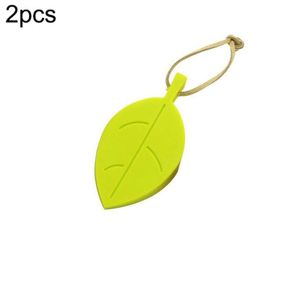 Lime green silicone leaf door stop with beige anti-pinch cord loop