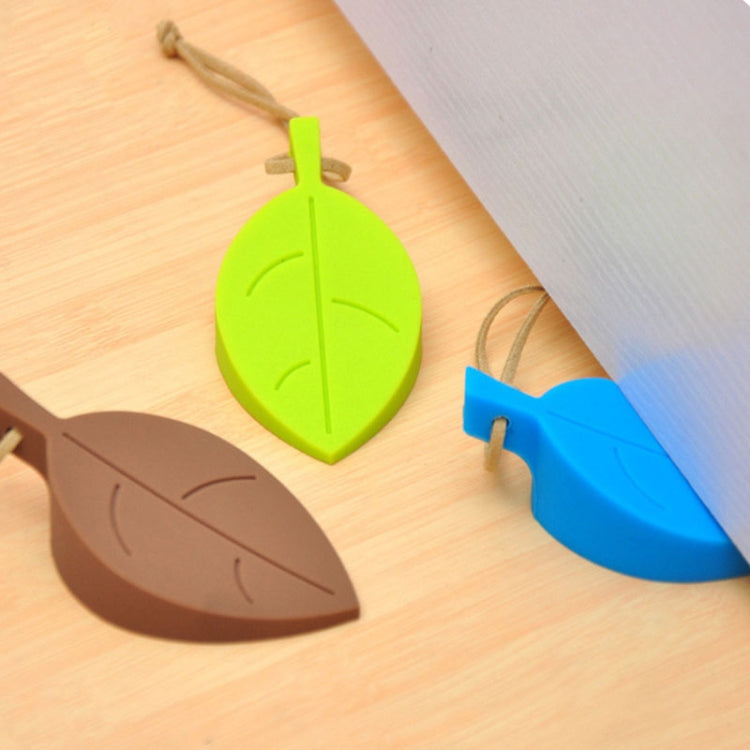 Set of silicone leaf door stops in green, blue, and brown with cord loops