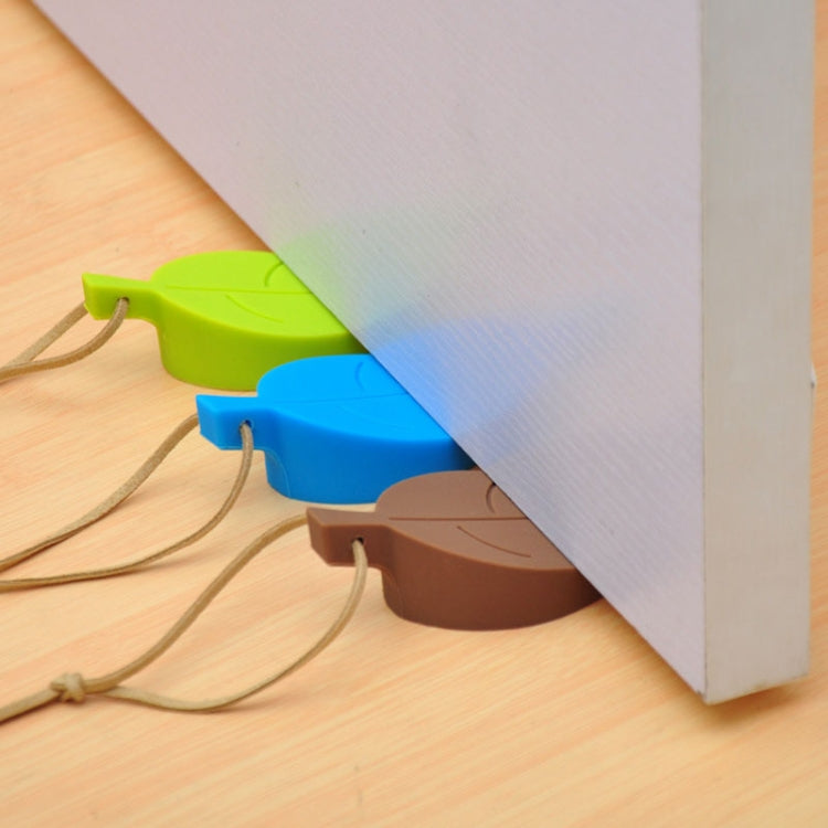 Silicone leaf door stops in green, blue, and brown with cord loops