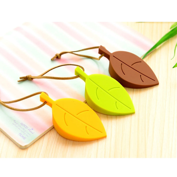 Silicone leaf door stops in green, yellow, and brown with cord loops