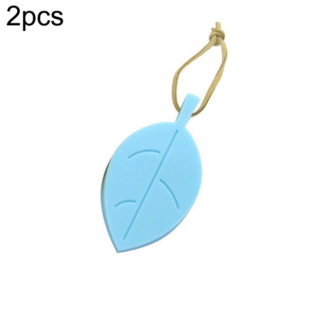 Light blue silicone leaf door stop with beige anti-pinch cord loop