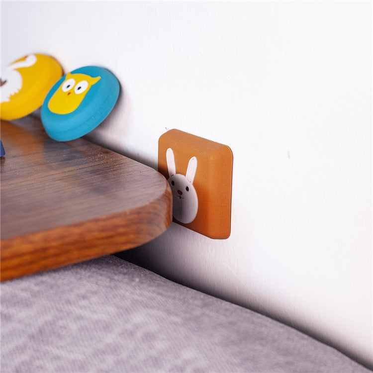 Orange silicone door-handle crash pad with white bunny icon
