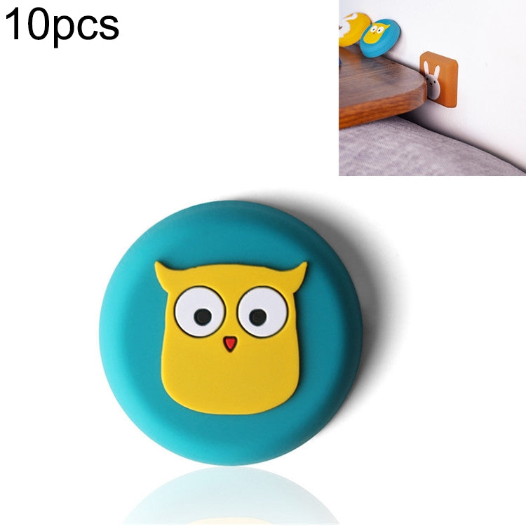 Teal round silicone wall pad with yellow owl face icon