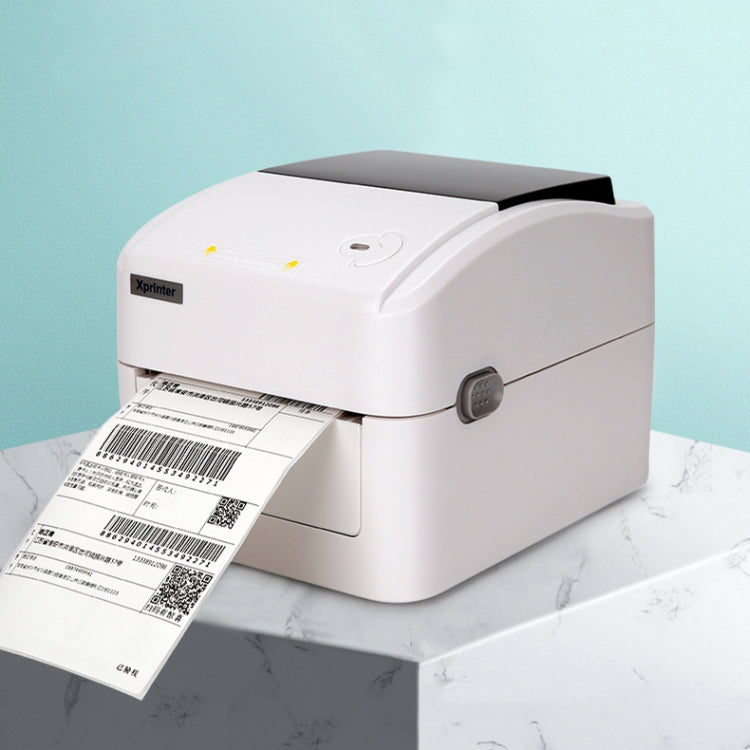 Thermal label printer with barcode labels exiting from front slot
