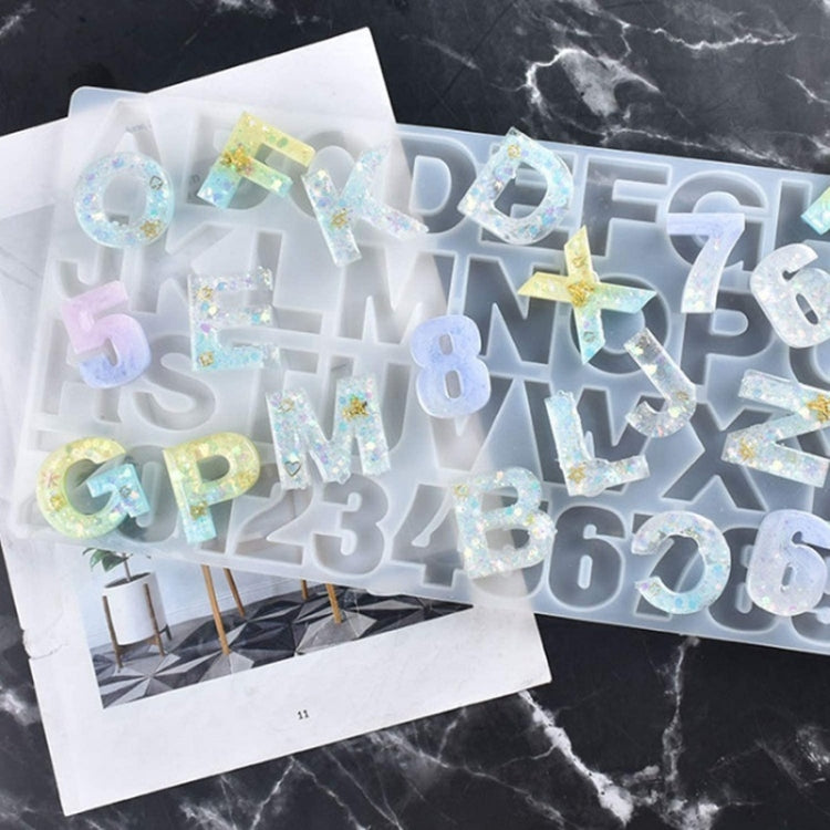 Clear silicone keychain mold with glitter letter and number charms