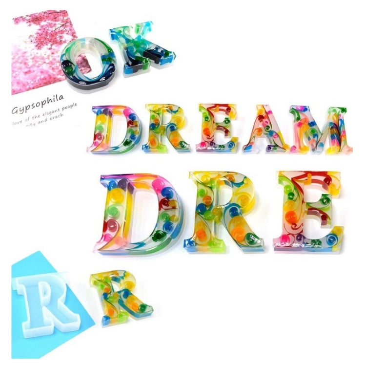 Colorful resin letter keychain charms made from the silicone mold