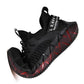 Black lace-up mesh sneakers with thick sole and red side traction accents