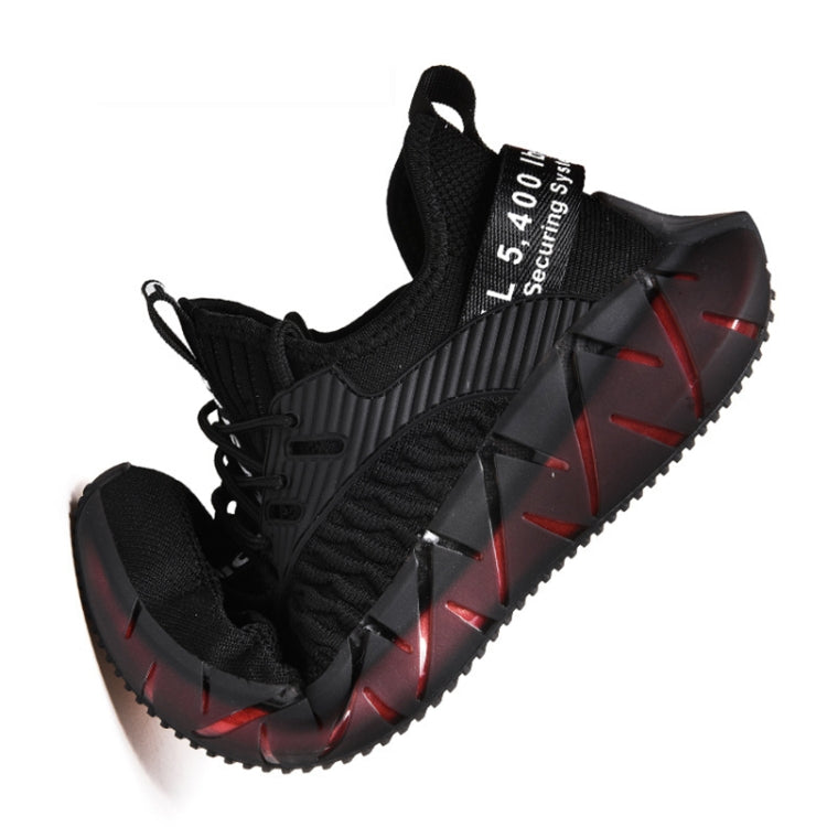 Black lace-up mesh sneakers with thick sole and red side traction accents