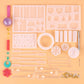 Silicone pendant mold set with assorted cavities, droppers, sprue rods, and chain parts