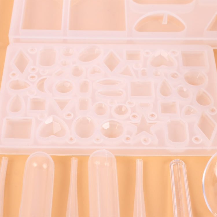Clear silicone mold tray with many pendant cavity shapes for resin casting