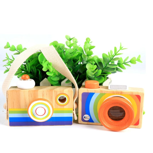 Wooden camera kaleidoscope toy set with rainbow-striped panels and orange-ring lens