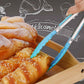 Blue silicone food clip holding bread with stainless-steel jaws
