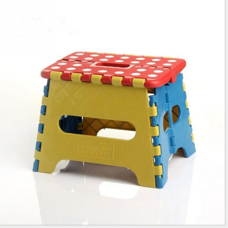 Kids plastic folding stool, yellow and blue with red polka-dot top panel