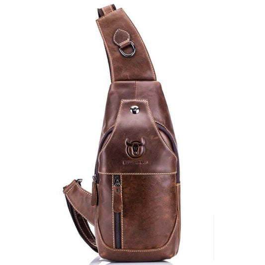 Brown leather crossbody chest bag with top loop buckle and front zipper pocket