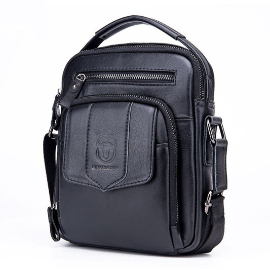 Black leather small shoulder satchel bag with zip pockets and front flap detail