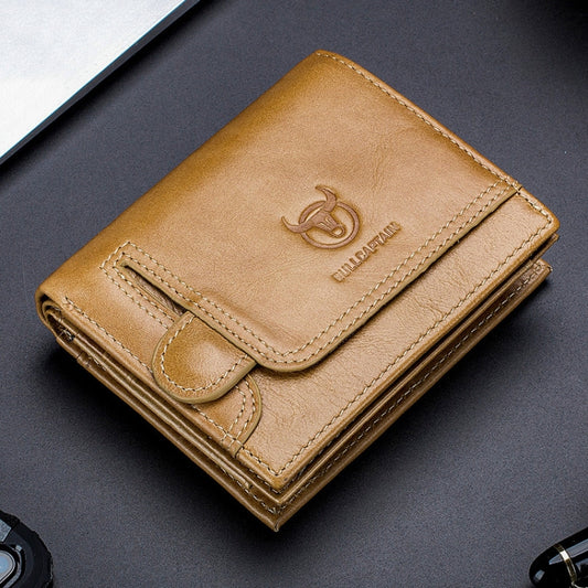 Tan leather wallet with snap closure, embossed logo, and front card/bill pocket