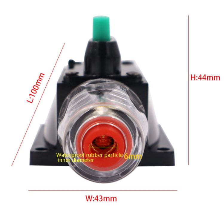 Watertight circuit breaker switch with green top button, clear cover, red interior