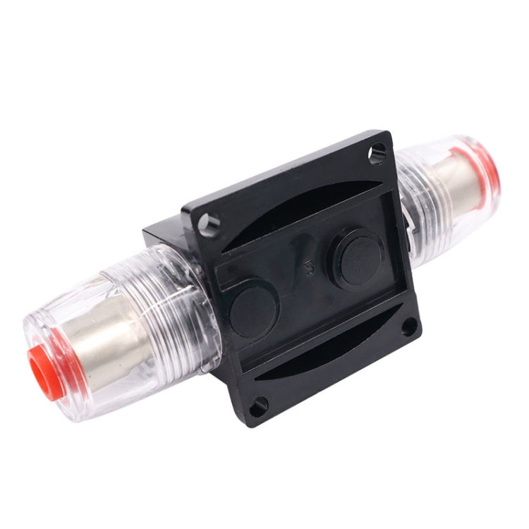 Inline circuit breaker switch with black housing, clear tube terminal covers, red ends