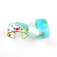 Finished clear blue resin bracelet bangle with pressed flowers