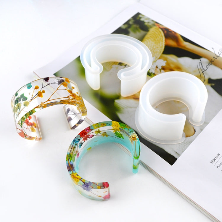 Finished floral resin bangles set with clear cuffs and colorful botanical accents