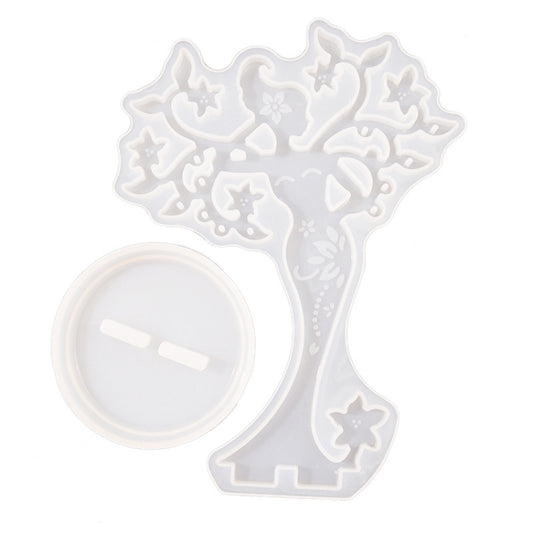 Epoxy jewelry ornament mold with tree silhouette, stars, and flower cutouts