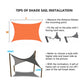 Orange waterproof shade sail with installation tip graphic and mounting points
